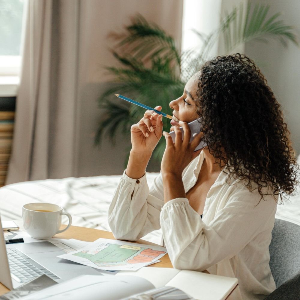 Young woman on a phone booking an appointment